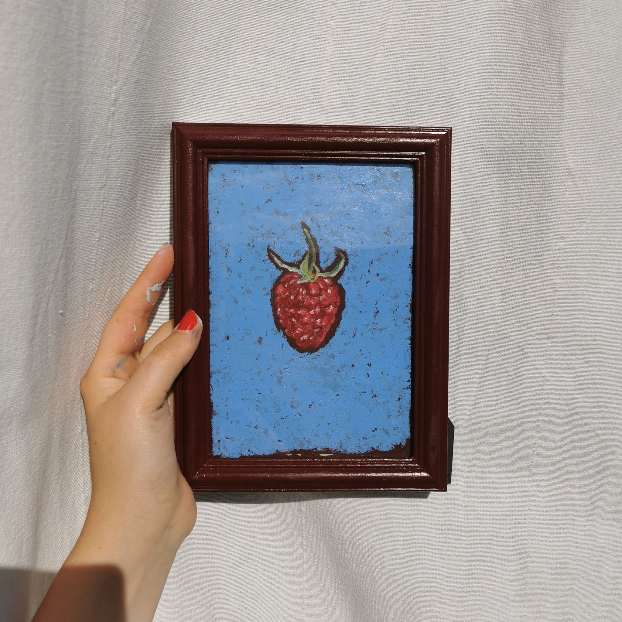 Himbeere auf hellblauem Hintergrund, Original aus Ölpastell.